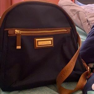 Calvin Klein navy blue nylon backpack brown straps